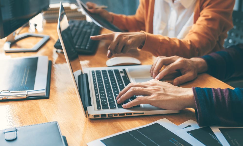 Professional Development programmer cooperating meeting and brainstorming and programming website